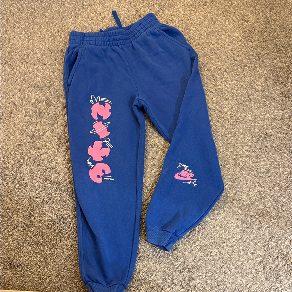 Nike Kids Joggers in Blue with Pink Graphics